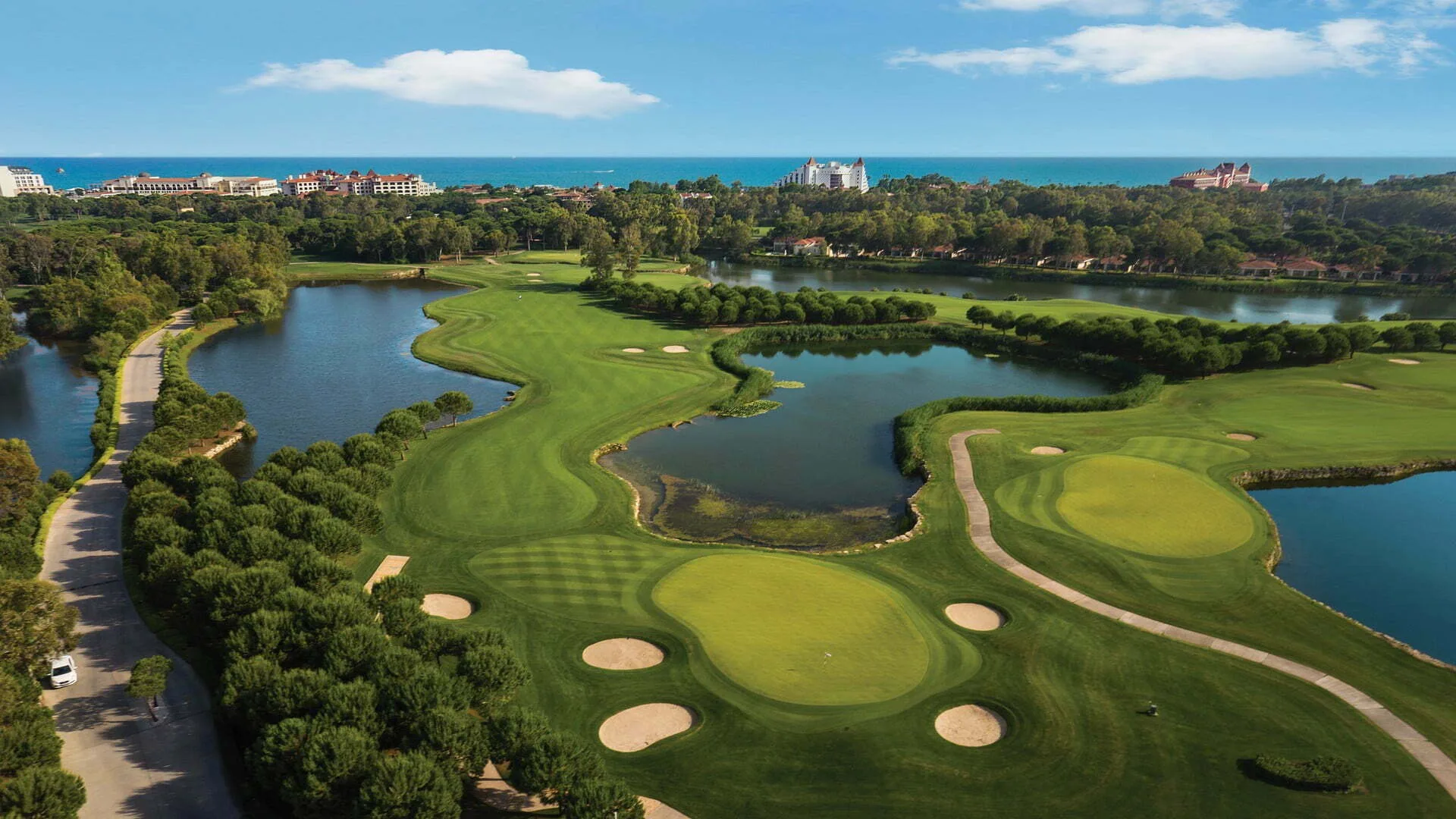 Aerial fairway and lake view on the PGA Sultan Course