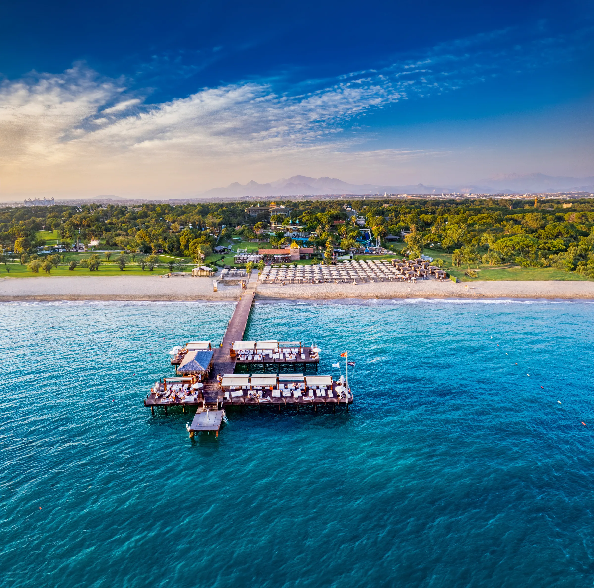 Gloria Verde Resort beach and pier